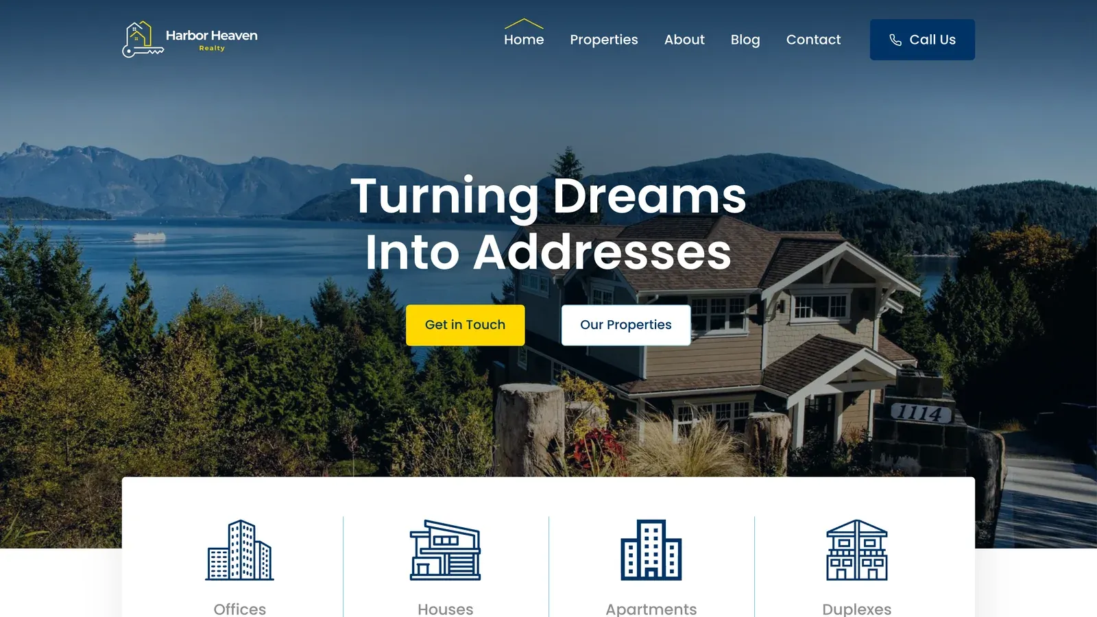 Homepage di Harbor Heaven Realty: titolo "Turning Dreams Into Addresses" su una casa affacciata sul lago, con gli ingressi per uffici, case, appartamenti e duplex